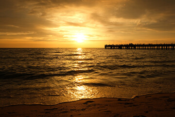 Silhouette Light of sunset on the beach. Aerial view sightseeing sea at koh kood island in thailand beach and panning the sunset sky with clouds.