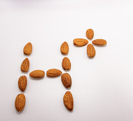 health sign made of almonds