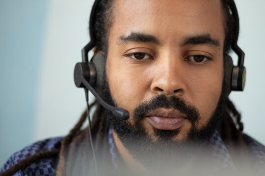 portrait of handsome latin man call center operator 