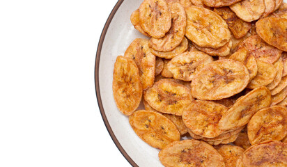 Banana chips on white background