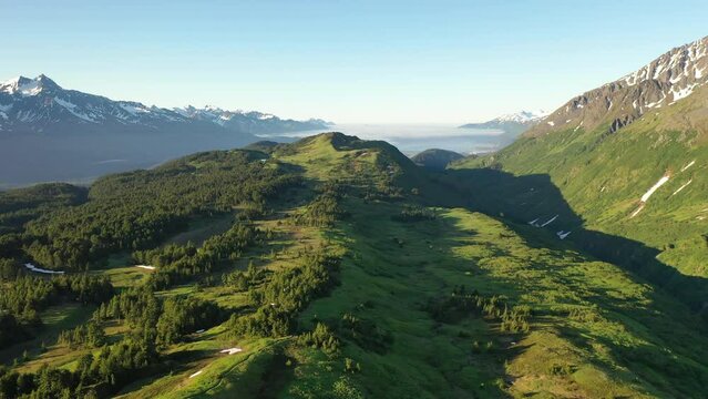 Beautiful sunrise landscape aerial view valley between mountains in Alaska, North America