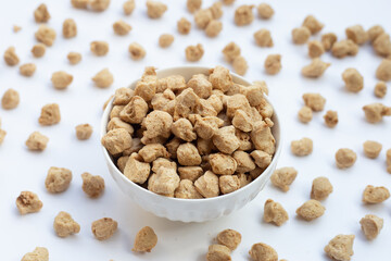 Textured soy protein on white background.