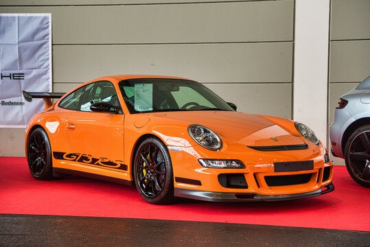 FRIEDRICHSHAFEN - MAY 2019: orange PORSCHE 911 997 GT3 RS 2006 turbo coupe at Motorworld Classics Bodensee on May 11, 2019 in Friedrichshafen, Germany
