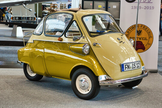 FRIEDRICHSHAFEN - MAY 2019: light yellow lemon BMW ISETTA 250 1955 at Motorworld Classics Bodensee on May 11, 2019 in Friedrichshafen, Germany