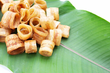 Crispy banana chip rolls. Fruit snack