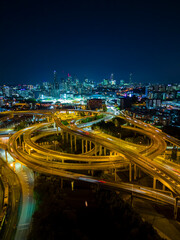 Aerial vertical view of Brisbane city and highway traffic in Australia at night - 542587136