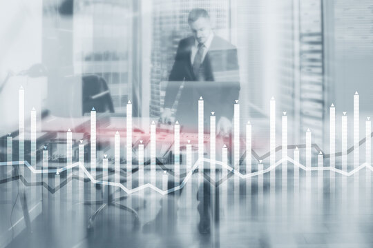 Bar graph on the background of a business center with a manager at the window