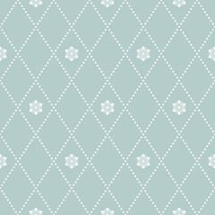 Floral ornament. Seamless abstract classic blue and white background with flowers. Pattern with repeating floral elements. Ornament for fabric, wallpaper and packaging