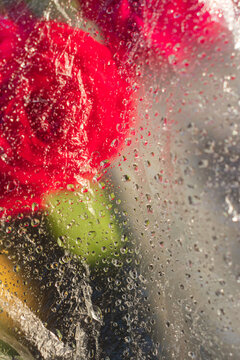 flowers under a film with water drops,a background image or a screensaver