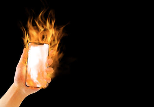 燃えるスマートフォンと手（SNS炎上・ネット炎上のイメージ）スマホ画面透過・黒背景 - Powered by Adobe