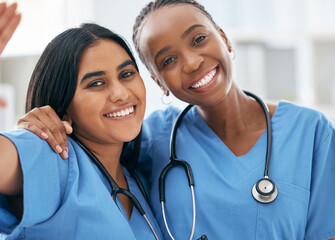 Doctors, selfie and women friends at hospital smile for photograph together with stethoscope. Happy, healthcare and interracial friendship picture of professional cardiology workers on break.
