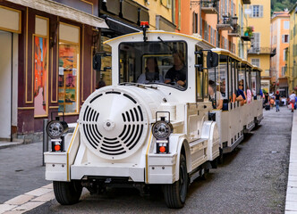 Tourist train in the narrow streets in Old Town, Vieille Ville in Nice, France