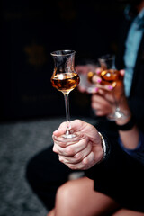 beautifully decorated cocktail in a nightclub, people drink a drink