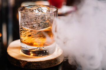 beautifully decorated cocktail in a nightclub, people drink a drink