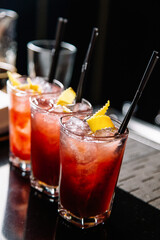 beautifully decorated cocktail in a nightclub, people drink a drink