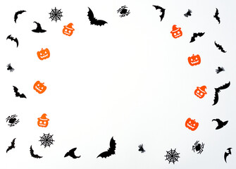 Halloween concept. Halloween paper decorations on white background. Greeting or invitation card. Flat lay style with copy space. Top view