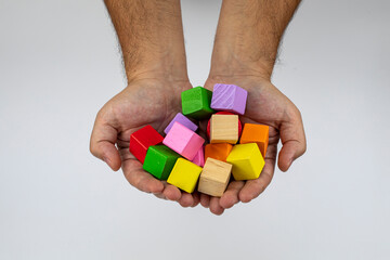 toy cubes in hand