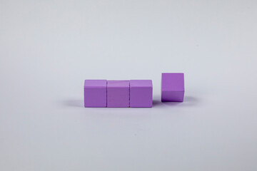 purple cubes side by side