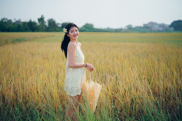 girl walking on rice fields