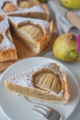 sweet home made pear almond pie on a table