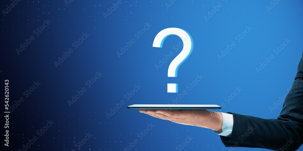 Poster close up of businessman hand holding tablet with abstract digital question mark on blue background. 