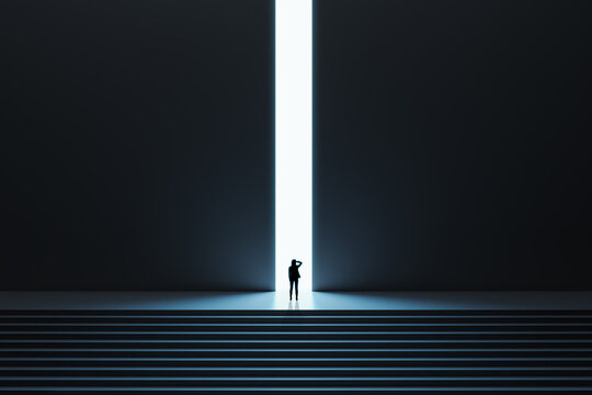 Business success and opportunity concept with pensive woman in front of bright light hole in the middle of wall in a dark huge dark hall with stairs
