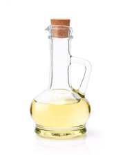 Oil in glass decanter bottle with cork stopper isolated on white background with clipping path.