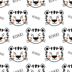 Obraz na płótnie Canvas Cute scandinavian seamless pattern with little Tiger and lettering roar in doodle style. Vector illustration - cartoon tiger.