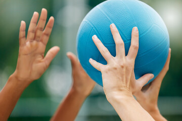 Netball, sport and athlete hands with ball, game and challenge on a court in urban city park...