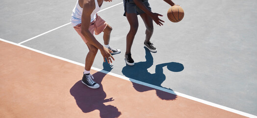 Sports, fitness and basketball training by men at basketball court for practice, exercise and...