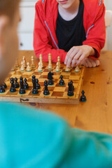 Fototapeta Two school boys playing chess obraz