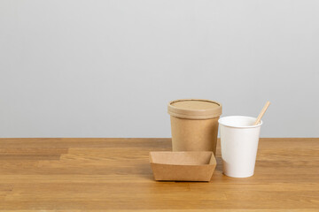 Eco friendly food packaging. Paper recycling zero waste natural products. A box of paper for food disposable catering of nature and recycling concept. Plastic free set on background.