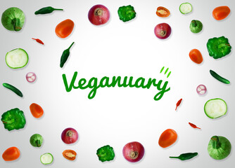 It's Veganuary instead of january background with vegetables and typography in center. Veganuary wallpaper design