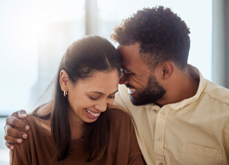 Couple, black people and love hug of a girlfriend and boyfriend with a smile together. Anniversary of happiness of a woman and man in a home laughing at a funny joke with happy bonding and affection