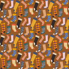 Colorful seamless pattern with different doodle socks on a brown background. 