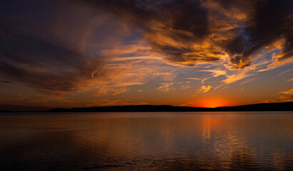 Obraz premium sunset over the river