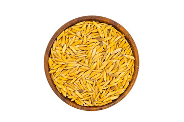 Top view, flat lay of closeup dry freshly harvested paddy in wooden bowl isolated on white background with clipping path.