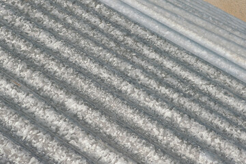 roof architecture: building with galvanized sheet metal canopy, durable and resistant easy to assemble. metal corrugations today revalued for modern buildings.