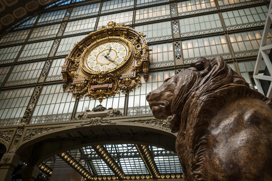 Clock and lion statue in Orsay museum, Paris, France