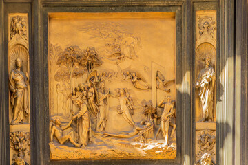 Florence, Italy. Baptistery (UNESCO). Fragment of the Eastern Gate. Lorenzo Ghiberti "Creation of Adam and Eve, original sin. An angel casts out Adam and Eve from heaven", 1425-1452