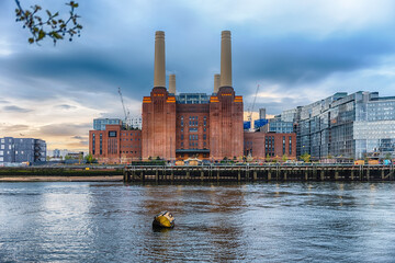 Battersea Power Station, iconic building and landmark facing the river Thames in London, England, UK - 542651556