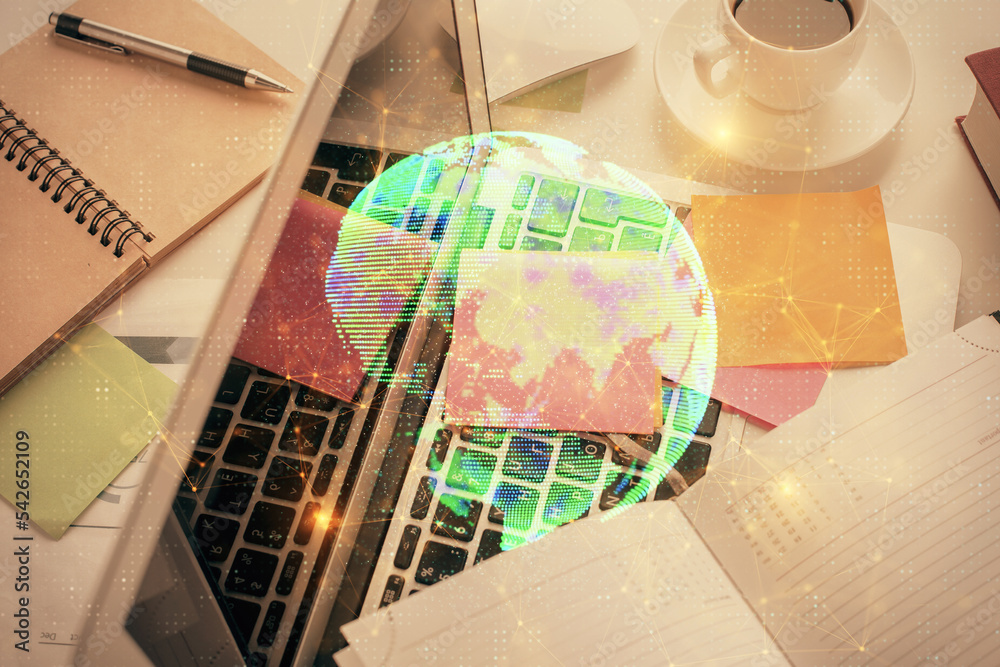 Poster social network hologram drawings over computer on the desktop background. top view. multi exposure. 