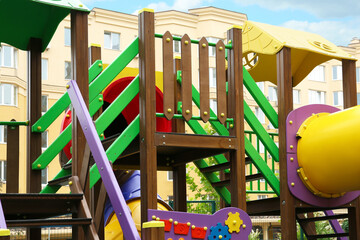 Colourful outdoor playground for children in residential area