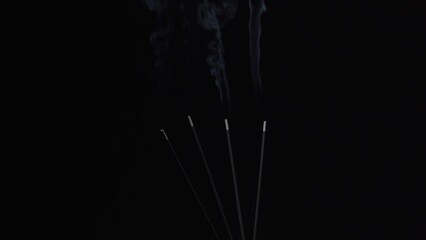 burning a agarbatti in baground dark place