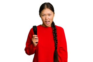 Young Chinese singer woman isolated screaming very angry and aggressive.