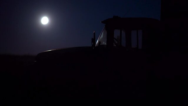 truck cab at night and full moon,old truck at night and the moon is shining