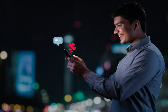 Businessman using modern interface on phone with virtual digital display 