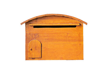 A brown wooden post box is used for delivering documents or mail on the front wall or white background door.