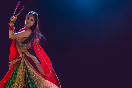 Gujrati woman performing Garba on stage