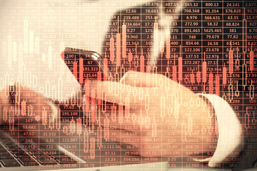 Multi exposure of man's hands holding and using a digital phone and forex graph drawing. Financial market concept.